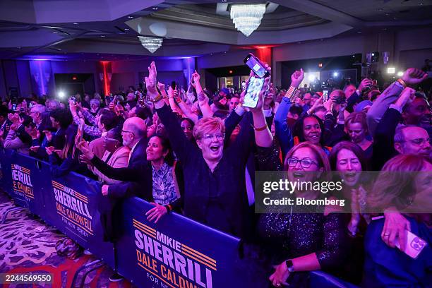 Attendees celebrate during an election night event with Representative Mikie Sherrill, Democratic gubernatorial candidate for New Jersey, not...