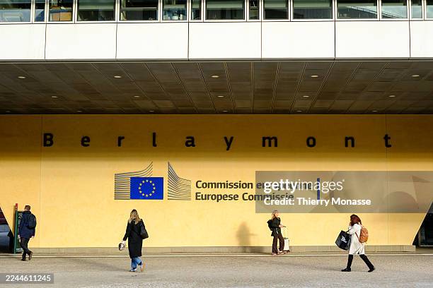 People walk in front of the Berlaymont, the EU Commission headquarter on November 5, 2025 in Brussels, Belgium. Civil servants in the Berlaymont work...