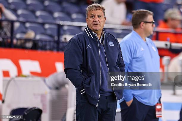 General manager Michael Lombardi of the North Carolina Tar Heels looks on prior to a game against the Syracuse Orange at JMA Wireless Dome on October...