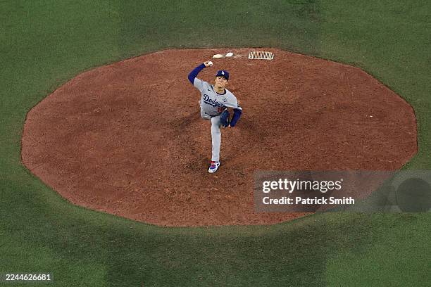 Yoshinobu Yamamoto of the Los Angeles Dodgers pitches against the Toronto Blue Jays during the eleventh inning in game seven of the 2025 World Series...