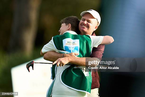 James Morrison of England and his son Finley Morrison celebrates after winning the Rolex Grand Final Supported By The R&A 2025 on day four of the...