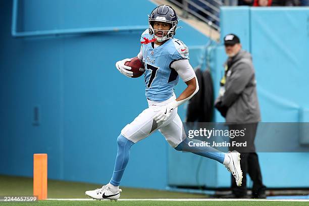 Chimere Dike of the Tennessee Titans scores a touchdown in the first quarter against the Los Angeles Chargers in the game at Nissan Stadium on...