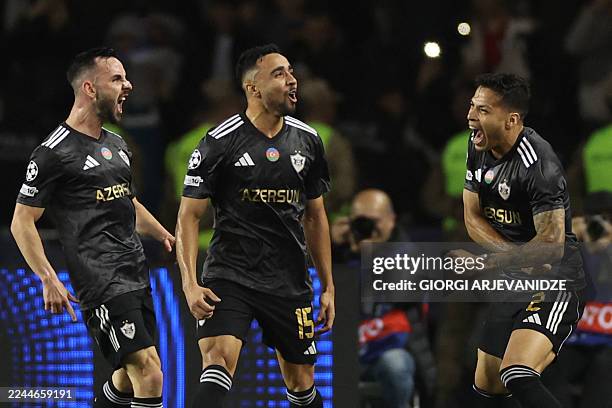 Qarabag's Cape Verdean midfielder Leandro Andrado celebrates after scoring the team's first goal during the UEFA Champions League league phase...