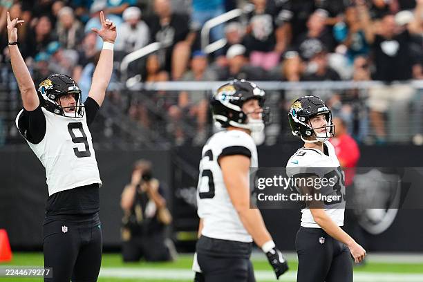 Logan Cooke of the Jacksonville Jaguars reacts after Cam Little kicks a 68-yard field goal during the second quarter in the game against the Las...