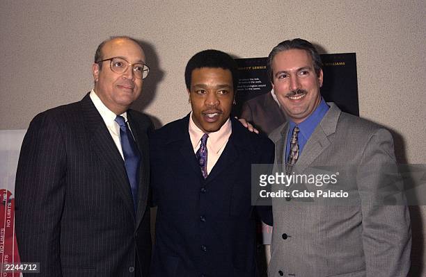 Co-Producers Adam Clayton Powell, IV, and Adam Clayton Powell, III, surround actor Russell Hornsby at the premiere of Showtime's "Keep the Faith,...
