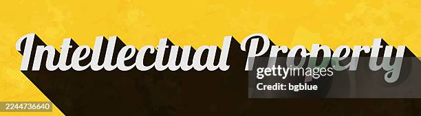 intellectual property - text with long shadow on textured yellow background - property damage stock illustrations