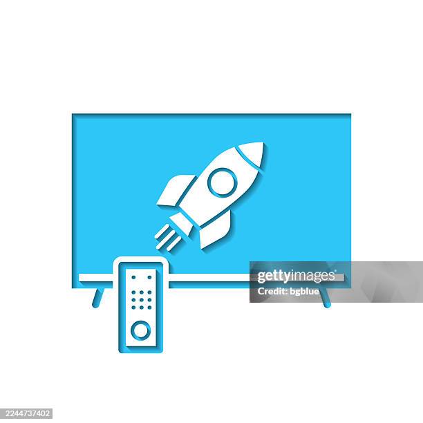 tv with rocket. icon cut out on white paper with blue background - watching rocket launch stock illustrations