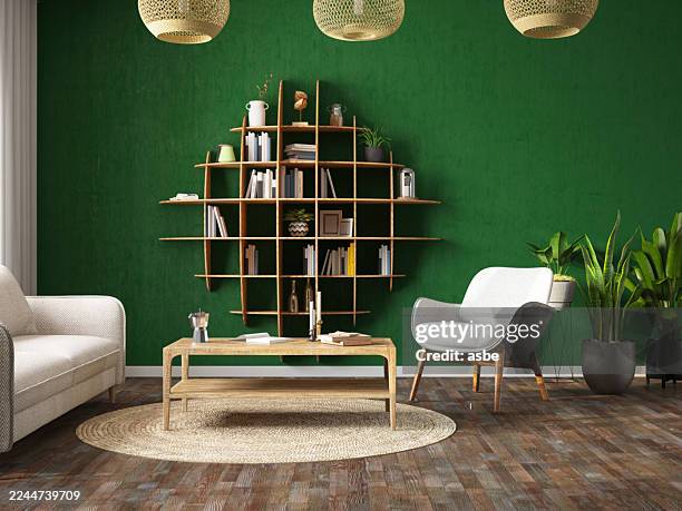 modern interior living room with a soft green wall and custom design bookshelf - shabby chic stock pictures, royalty-free photos & images