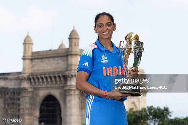 Harmanpreet Kaur of India poses with the ICC Women's World Cup Trophy after the ICC Women's World Cup 2025 Final match between India and South Africa...