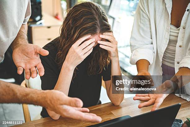 a boss reprimands his subordinate in the office - bullying stock pictures, royalty-free photos & images