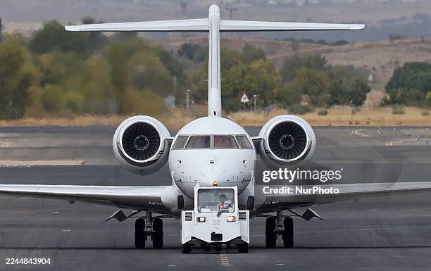Gestair Bombardier Global Express is towed by a tow tractor at Adolfo Suarez Airport in Madrid, Spain, on October 12, 2025.