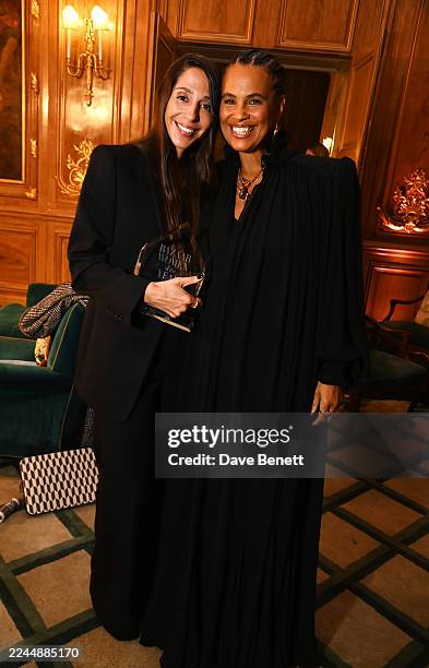 Chemena Kamali, winner of the Designer award, and Neneh Cherry pose in the winners room at the 2025 Harper's Bazaar Women of the Year Awards, held in...