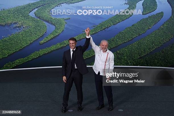 President of France Emmanuel Macron and President of Brazil Luiz Inacio Lula da Silva shake hands after a bilateral meeting during the "Belem Climate...
