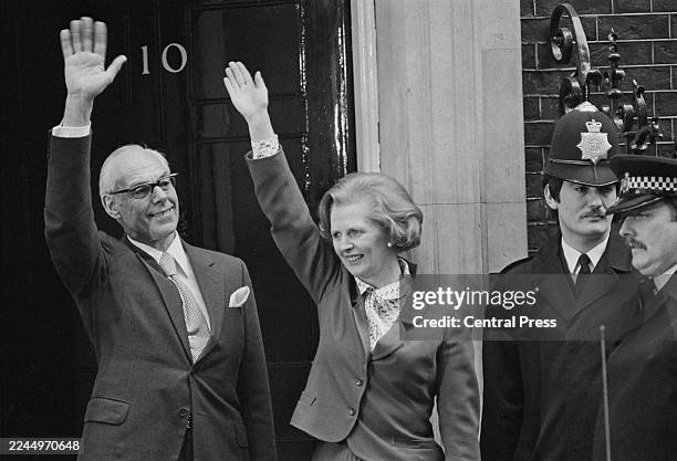 New Prime Minister Margaret Thatcher and husband Denis Thatcher, waving outside the entrance to 10 Downing Street after winning the General Election,...