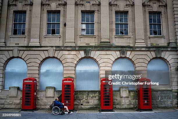 Broken windows and out of order phone boxes of the former central Post Office on November 04, 2025 in Blackpool, England. Seven neighbourhoods in...