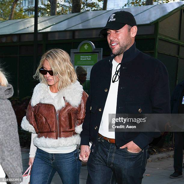 Sydney Sweeney and Scooter Braun are seen in Bryant Park on November 04, 2025 in New York City.