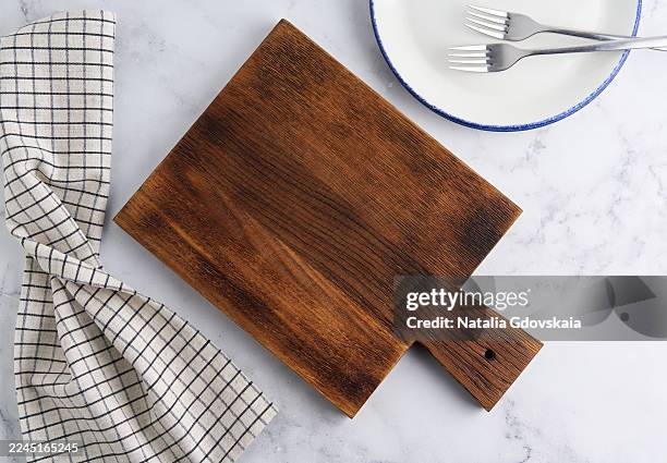 overhead empty rustic wooden cutting board on marble - chopping board stock pictures, royalty-free photos & images