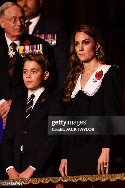 Britain's Prince George of Wales and Britain's Catherine, Princess of Wales attend The Royal British Legion Festival of Remembrance event at the...