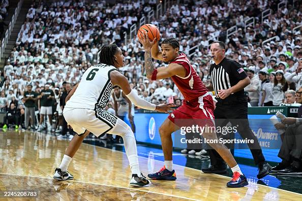 Acuff Jr Razorback Arkansas Razorbacks guard Darius Acuff Jr. is defended tightly by ...