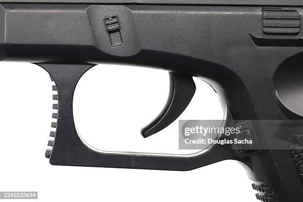 trigger on a firearm - trigger stock pictures, royalty-free photos & images