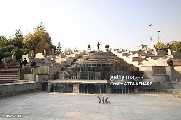Dry water feature collects dust in a Mellat Park, as the Iran faces sever water shortages, in Tehran on November 9, 2025. Iran was laying plans on...