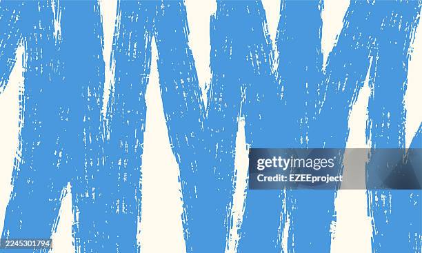 abstract blue brush stroke zigzag. grungy distressed chevron background. hand painted rough stripe texture. contemporary scribble art wallpaper. blue and beige hatching abstract - zigzag stock illustrations