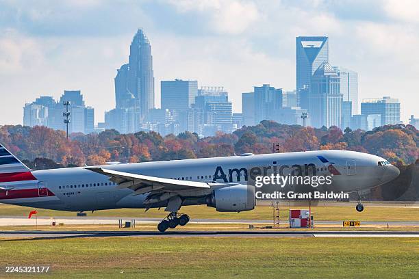 An American Airlines plane lands at Charlotte-Douglas International Airport on November 9, 2025 in Charlotte, North Carolina. The FAA has targeted 40...