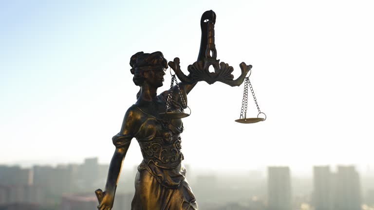 https://media.gettyimages.com/id/2245343368/video/legal-law-concept-statue-of-lady-justice-with-scales-of-justice-against-blue-sky-and-city.jpg?b=1&s=640x640&k=20&c=Z-wtXdJPA_D621rHMWwdZ2zCDfgtDCqBcF68cAKHGHc=