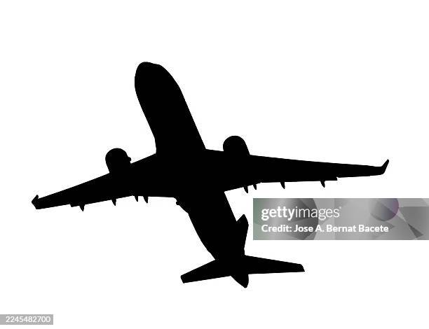 vector illustration of the silhouette of a commercial passenger plane rising after takeoff on a white background. - aeroplane part stock pictures, royalty-free photos & images