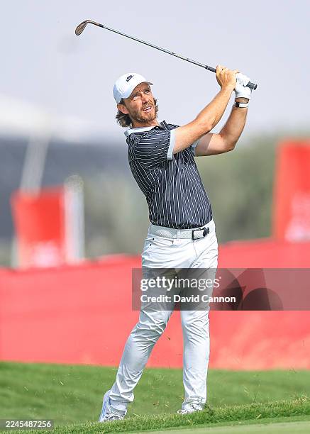 Tommy Fleetwood of England plays his second shot on the 10th hole during the second round of the Abu Dhabi HSBC Championship 2025 at Yas Links Golf...
