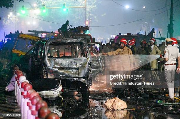 Fire Brigade trying to douse fire after a blast near the Red Fort Metro Station Gate No. 1. On November 10, 2025 in New Delhi, India. Eight deaths...