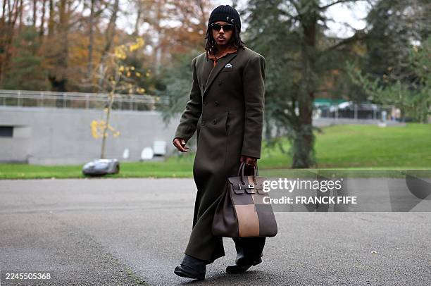 France's defender Jules Kounde arrives for a training camp as part of preparations for the upcoming FIFA World Cup 2026 Group D European...