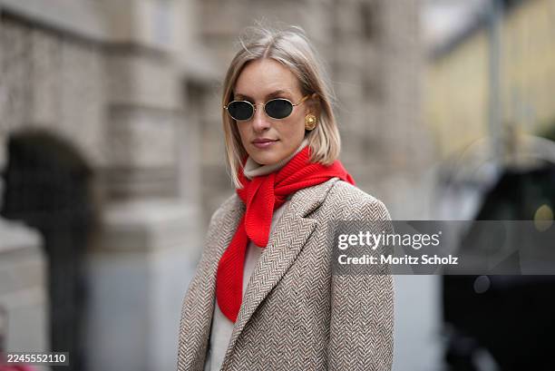 Marlies Pia Pfeifhofer is seen wearing a beige herringbone wool blazer with flap pockets and a relaxed fit by Sézane; a cream cashmere turtleneck...