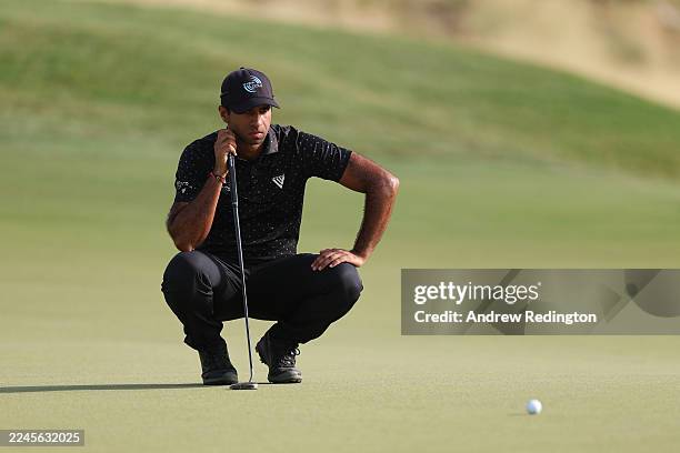 Aaron Rai of England lines up a putt on the 12th green on day three of the Abu Dhabi HSBC Championship 2025 at Yas Links Golf Course on November 08,...