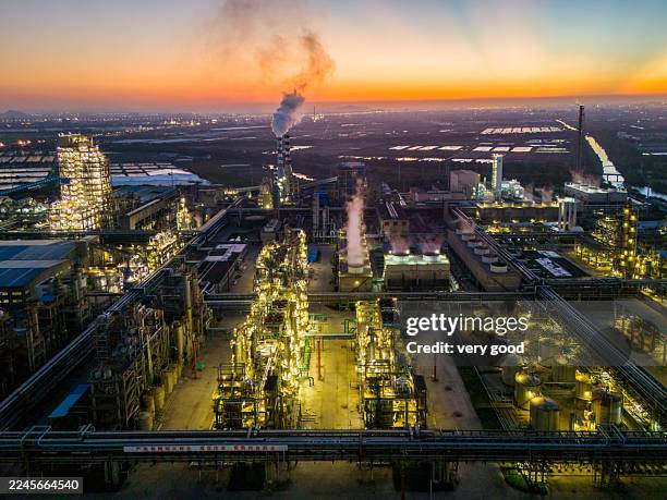 aerial view petrochemical plant with twilight. - distillation tower stock pictures, royalty-free photos & images