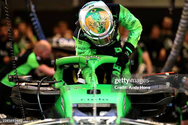 Gabriel Bortoleto of Brazil and Stake F1 Team Kick Sauber prepares to drive in the garage during qualifying ahead of the F1 Grand Prix of Brazil at...