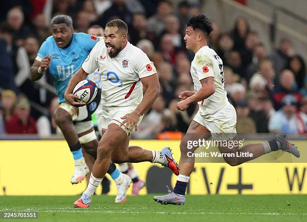 Ollie Lawrence of England runs with the ball during the Quilter Nations Series 2025 match between England and Fiji at Allianz Stadium on November 08,...