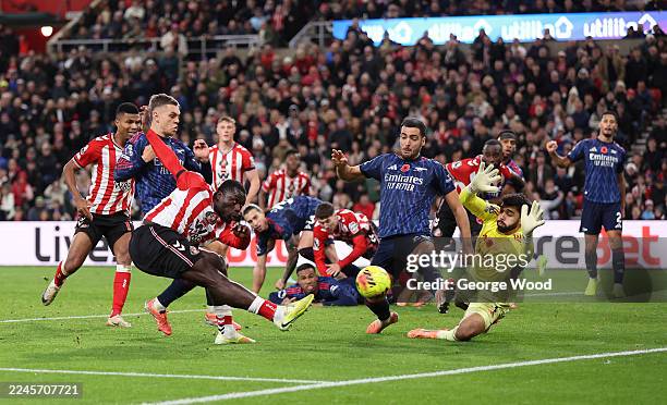 David Raya of Arsenal saves a shot from Brian Brobbey of Sunderland during the Premier League match between Sunderland and Arsenal at the Stadium of...