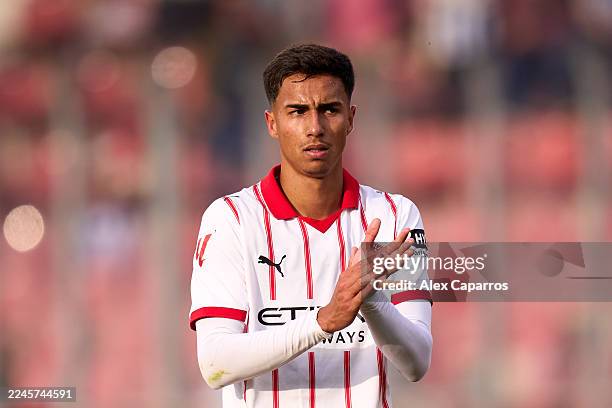 Vitor Reis of Girona FC applauds the supporters following the LaLiga EA Sports match between Girona FC and Deportivo Alaves at Montilivi Stadium on...
