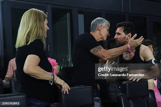 Lionel Messi of Inter Miami CF greets his parents, Jorge Messi and Celia Cuccittini after the 2025 MLS Cup Playoff match between Inter Miami CF and...