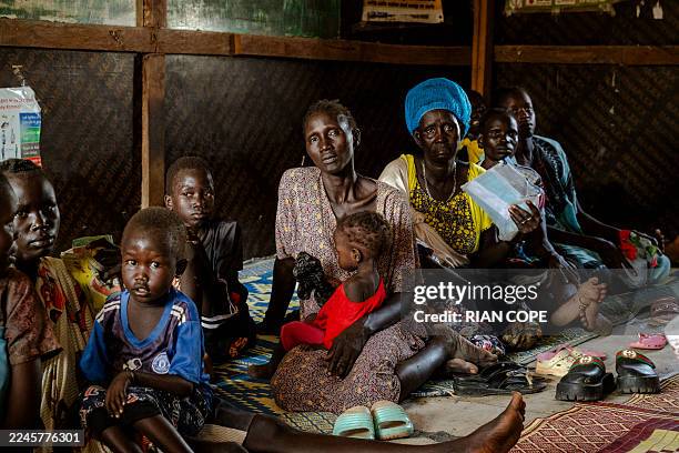 Group of women and their children wait for the Targeted Supplementary Feeding Programme activities at a facility in Sector 2 , Bentiu, Unity State,...