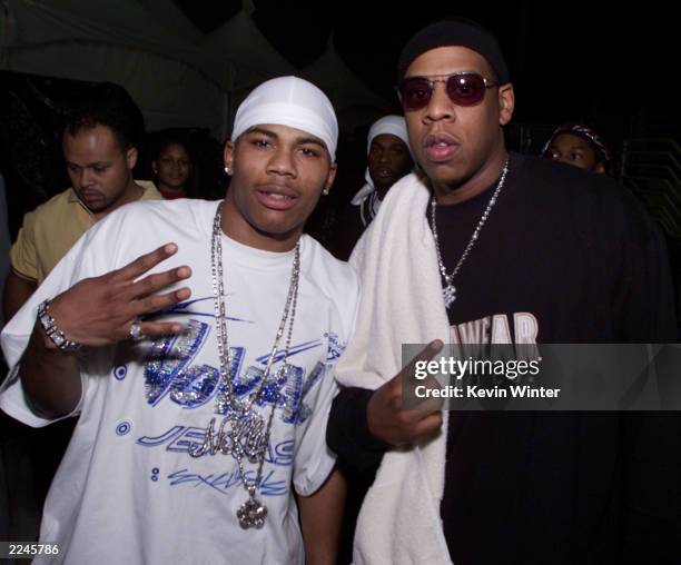 Rap artists Nelly and Jay-Z pose backstage after the 2000 Radio Music Awards at the Aladdin Hotel in Las Vegas, 11/04/00.