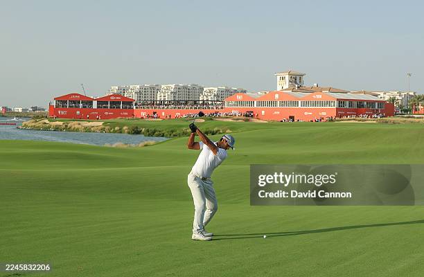 Aaron Rai of England plays his second shot on the 18th hole during the final round of the Abu Dhabi HSBC Championship 2025 at Yas Links Golf Course...