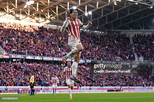 Yuito Suzuki of SC Freiburg celebrates scoring his team's first goal during the Bundesliga match between SC Freiburg and FC St. Pauli at Europa-Park...