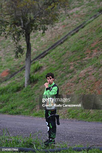 Gabriel Bortoleto of Brazil and Stake F1 Team Kick Sauber watches from the sidelines after a crash during the F1 Grand Prix of Brazil at Autodromo...