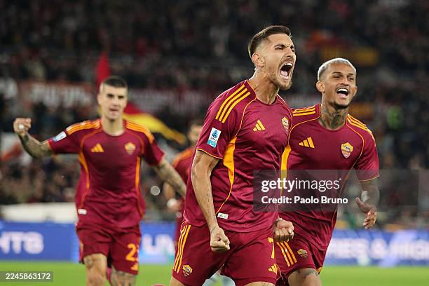 Lorenzo Pellegrini of AS Roma celebrates scoring his team's first goal from the penalty spot with teammate Wesley Franca of AS Roma during the Serie...