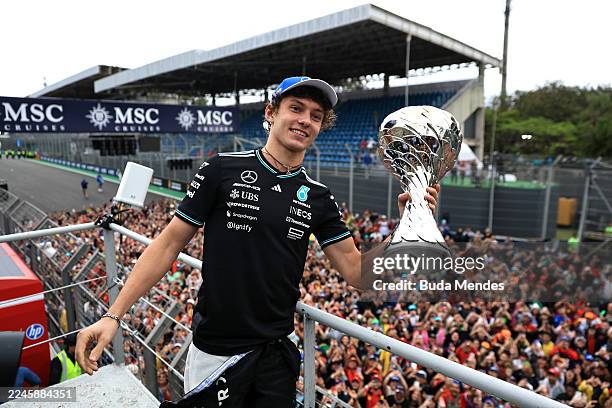Second placed Andrea Kimi Antonelli of Italy and Mercedes AMG Petronas F1 Team celebrates with his trophy during the F1 Grand Prix of Brazil at...