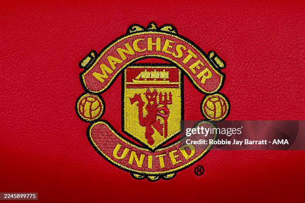 Detail of A Manchester United emblem seen on a seat in the dugout during the UEFA Women's Champions League 2025/26 league phase match between...
