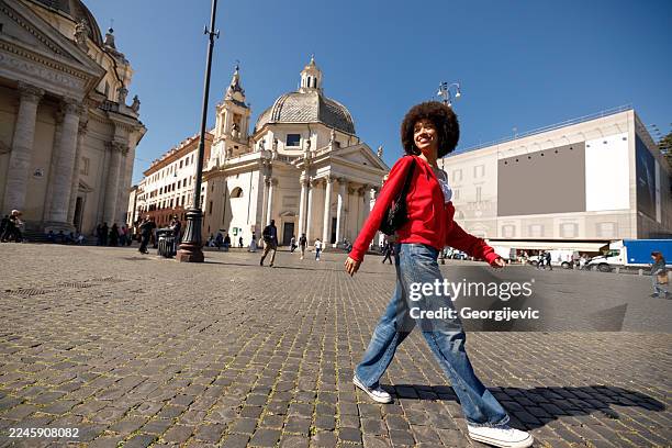 smiling woman exploring rome - piazza del popolo stock pictures, royalty-free photos & images