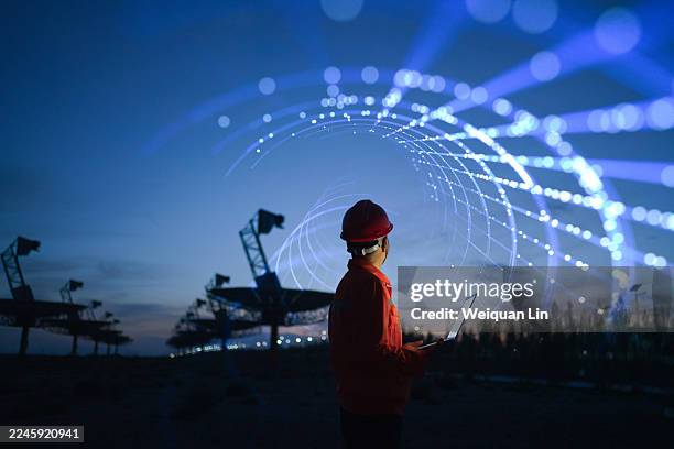 asian men use artificial intelligence - telecommunications equipment stock pictures, royalty-free photos & images